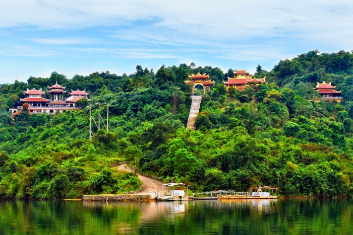 Truc Lam Zen Monastery surrounded by lush green hills