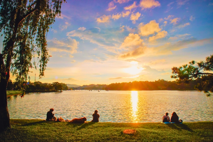 Golden sunset by the tranquil Xuan Huong Lake