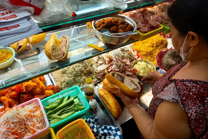 Try my first Banh Mi in Saigon from a street vendor