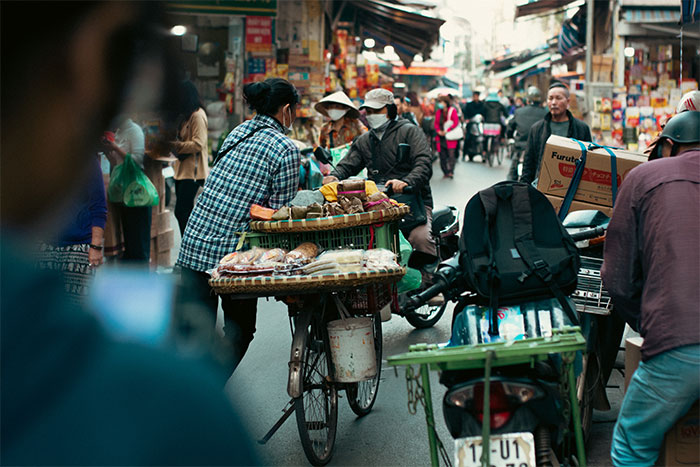 A food vendor on 36 streets of Hanoi.