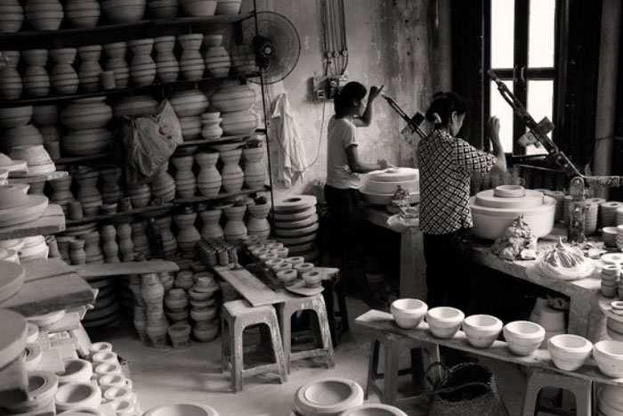 An old photo of a ceramic workshop.