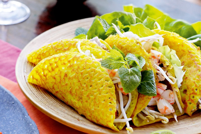 Banh xeo, a highly-recommended Hanoi street food for tourists