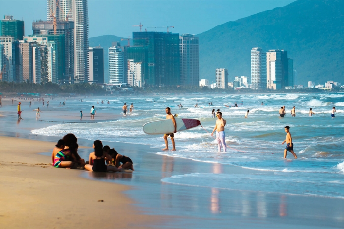 Swimming at My Khe Beach, the pearl of Da Nang