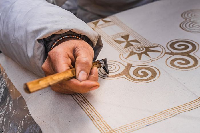 Traditional Hmong beeswax patterns technique