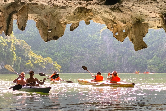 Kayaking through Halong bay's caves