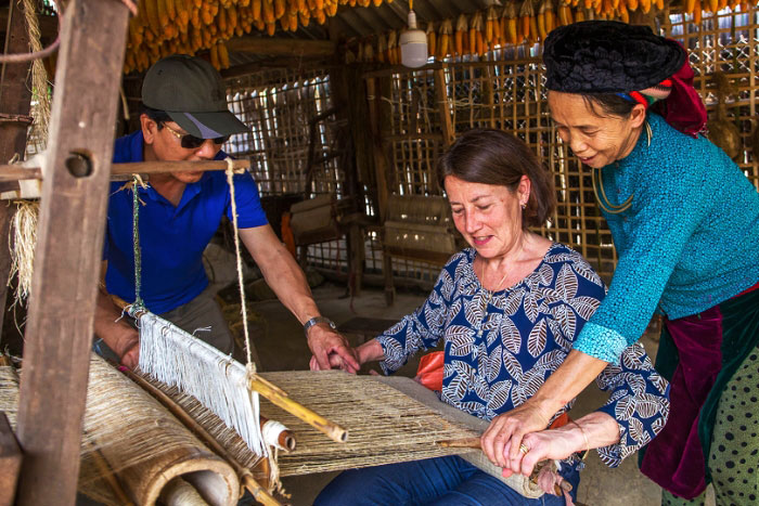 Tourists and local people experience daily work