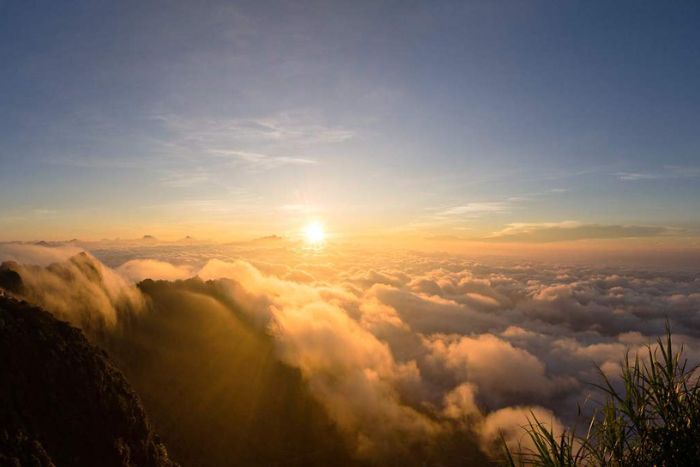 Watching the sunrise from the roof of Ha Giang is an experience not to be missed