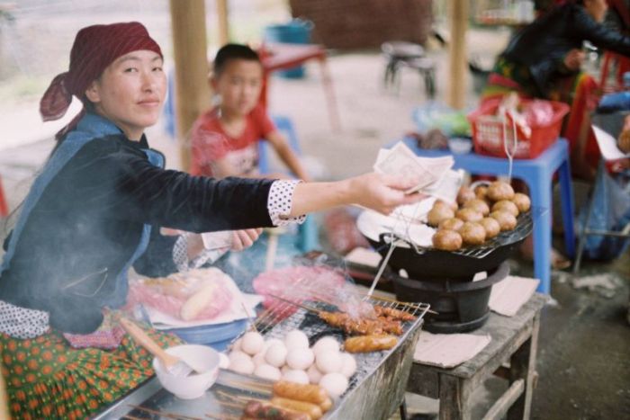 Savor the dishes at Hoang Su Phi market for an authentic culinary experience