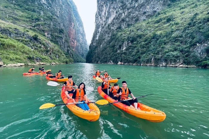 Kayaking under Tu San Canyon will be an interesting activity for a family trip to Ha Giang, Vietnam