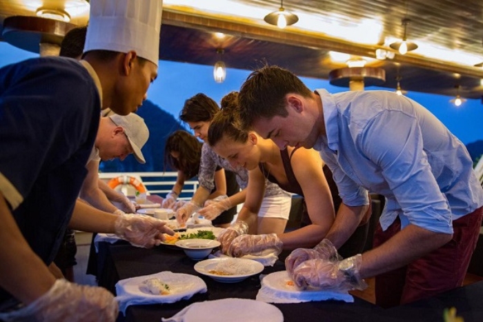 A warm dinner on the peaceful waters of Halong Bay