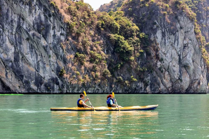 Kayaking around Halong Bay.
