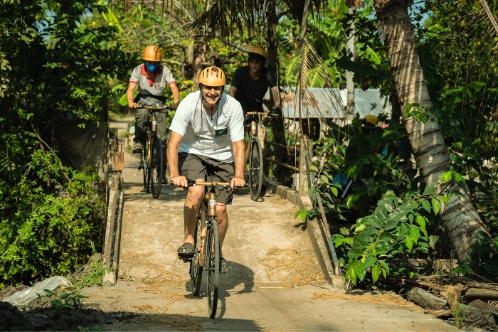Cycling through the rural landscapes of Ben Tre, an authentic travel experience in Southern Vietnam