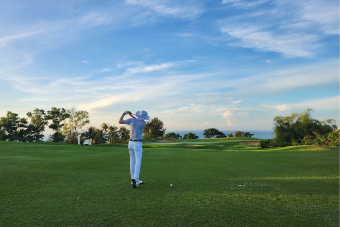 Golf travelers enjoying their swing in Ho Chi Minh City, a highlight of the 1-week golf package experience