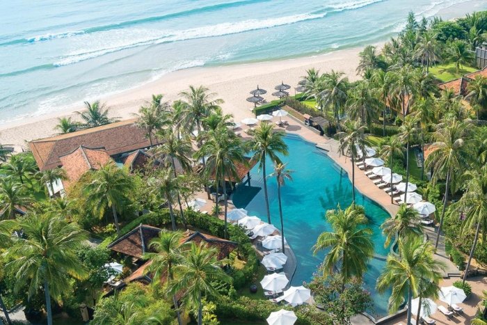 The spacious grounds and ocean-facing swimming pool at Anantara Hoi An Resort