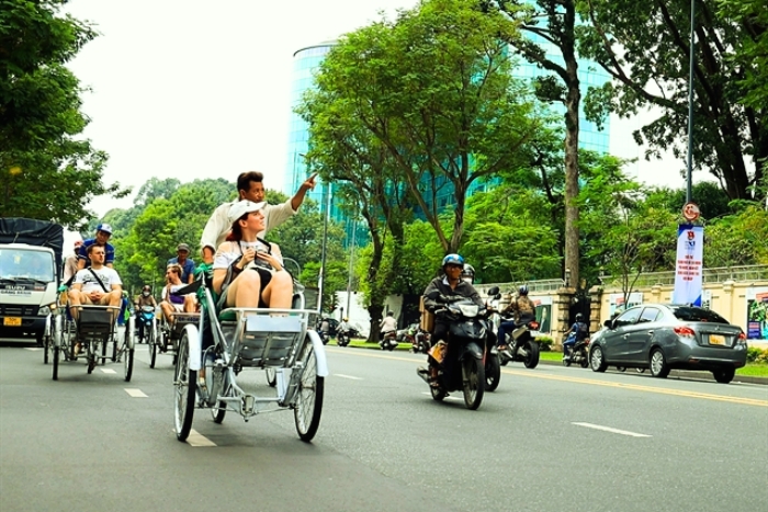 At the pace of a cyclo, life in Ho Chi Minh City