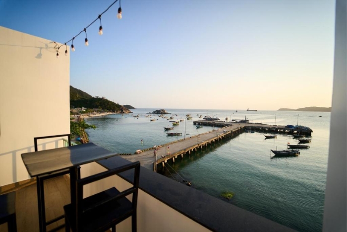 Immerse yourself in the charm of the sea view from the terrace of Cham's Corner Lookout Homestay & Restaurant 