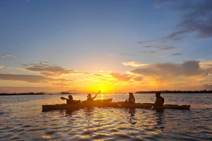 Girls' boat trip on the Thu Bon river at sunset