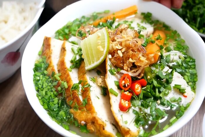 Vietnamese thick noodle soup with fish cake