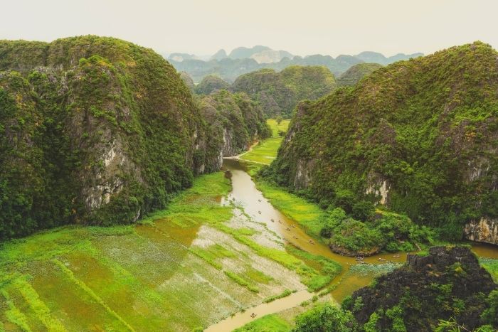 The Tam Coc boat tour remains the most iconic activity in Ninh Binh