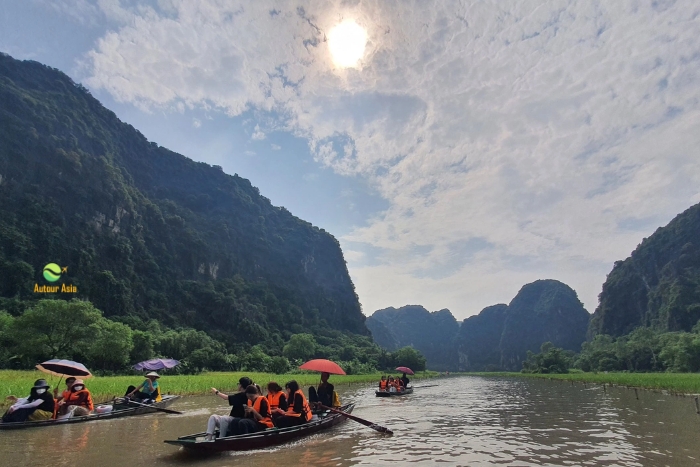 A typical scene in Tam Coc – Gently rowing along the Ngo Dong river