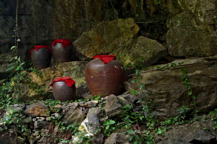 Many wine jugs are placed here and there throughout the cave