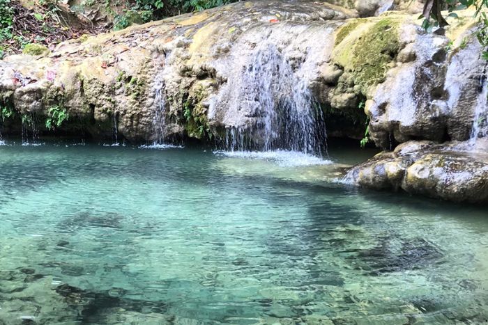 Crystal-clear water at the waterfall in Pu Luong