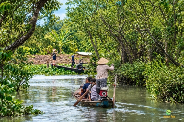 Sampan ride along the canals of the Mekong Delta