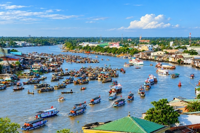At sunrise on Cai Rang Floating Market during 15 days in Vietnam in March