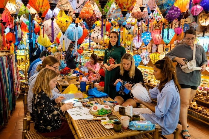 Making lanterns together, a lovely memory of Hoi An with the family