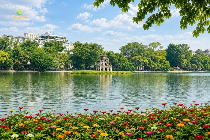 Strolling along Hoan Kiem Lake in the heart of Hanoi