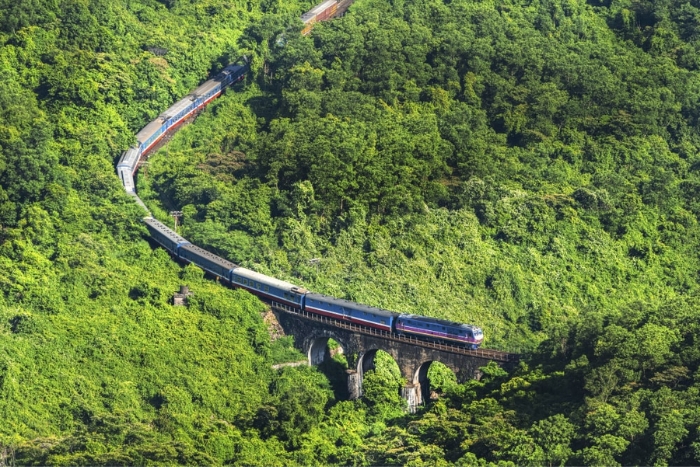 The train passes through the majestic Bach Ma mountain range