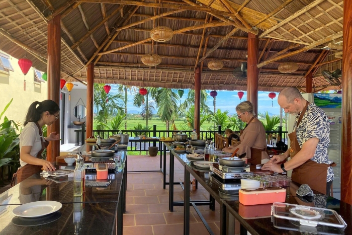 A cooking class in Hoi An for your 2 week Vietnam itinerary for seniors