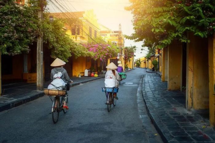 Travelers enjoying a tropical sunset