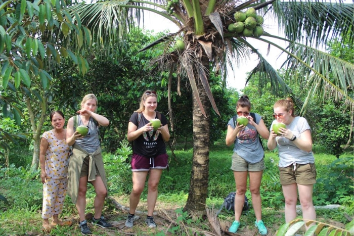 Explore the fruit paradise and enjoy fresh coconut water