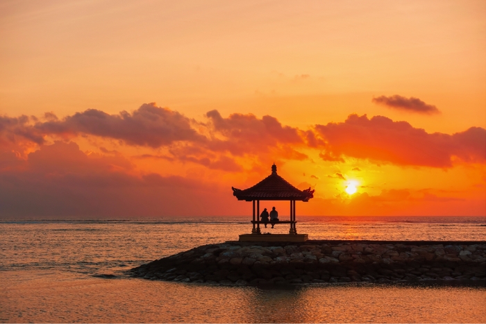Golden sunrise over Sanur shoreline