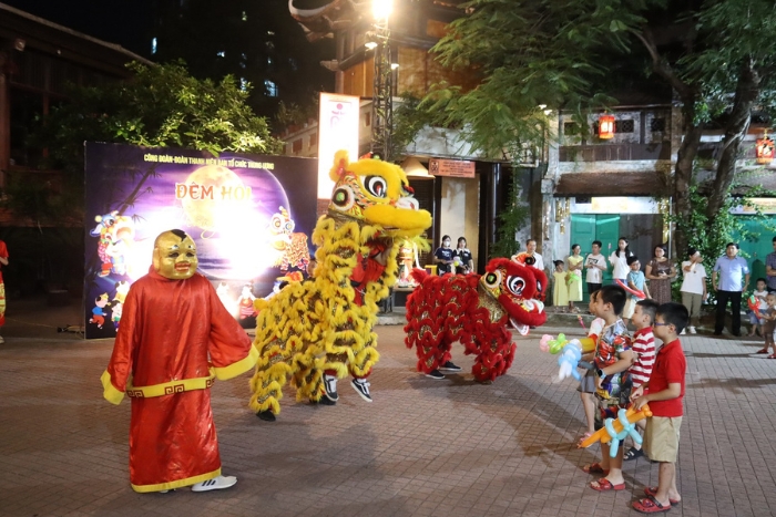 Lion dancing in street in Tet Trung Thu in Vietnam 